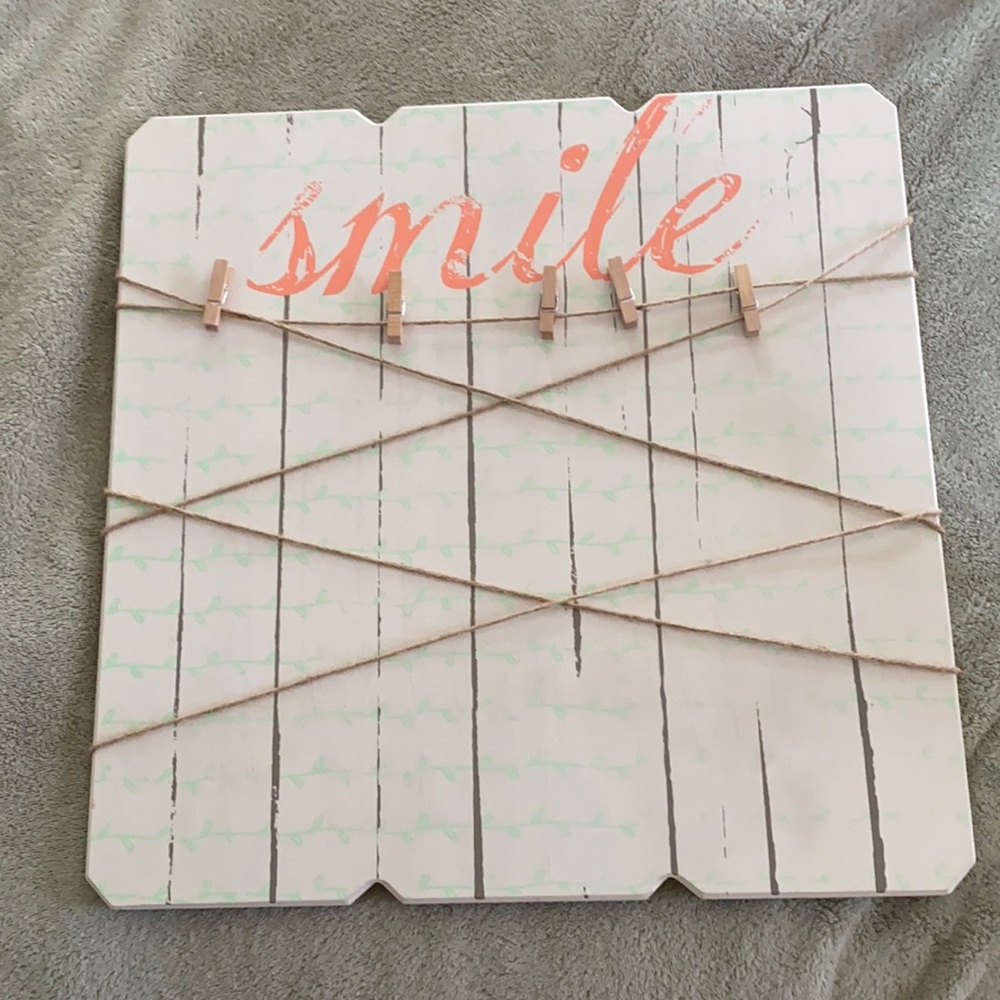 Picture hanging sign